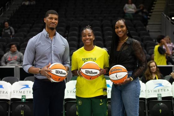 From left to right: Coinbase’s Chukwukere Ekeh, Seattle Storm’s Jewell Loyd and Crystal Langhorne at the announcement of their partnership (Seattle Storm)