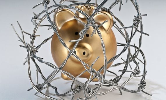 piggy bank barbed wire