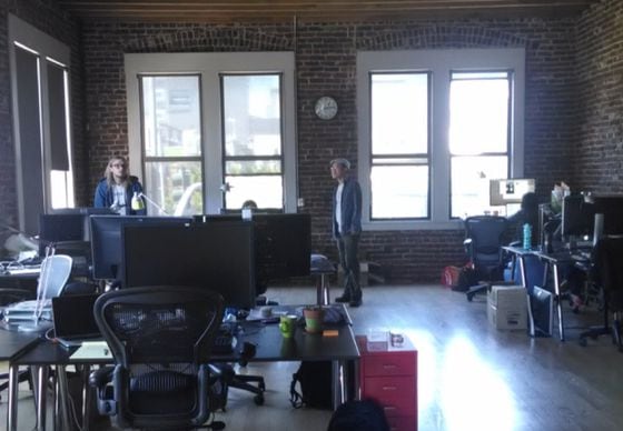  Kraken CEO Jesse Powell (left) and Product Manager Elliot Lee (centre) in the company's office.