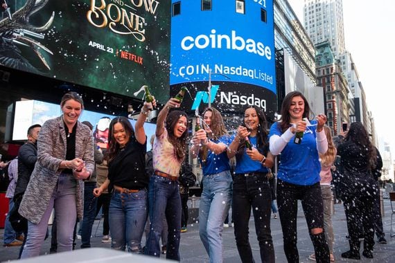 Coinbase employees after the company's direct listing on Nasdaq in April. 