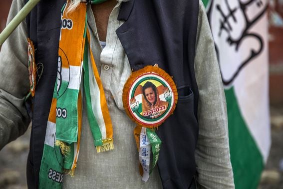 A supporter wearing a ribbon featuring former Indian National Congress (INC) President Sonia Gandhi. (Prashanth Vishwanathan/Bloomberg via Getty Images)