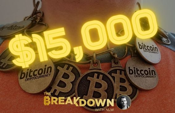 Bitcoin necklace created from bitcoin keychains, with $15,000 superimposed over the image.