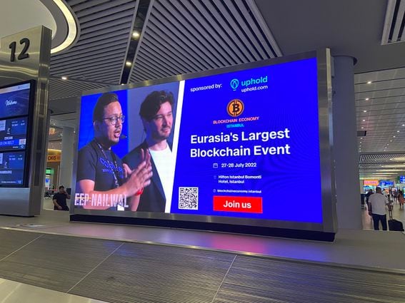 Polygon co-founder Sandeep Nailwal in an ad at Istanbul's airport (Amitoj Singh/CoinDesk)