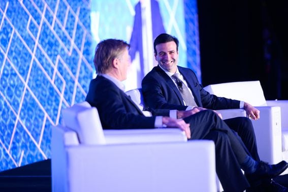 CFTC Chairman Heath Tarbert, right, speaks to CoinDesk Chief Content Officer Michael Casey at Invest:NYC 2019.