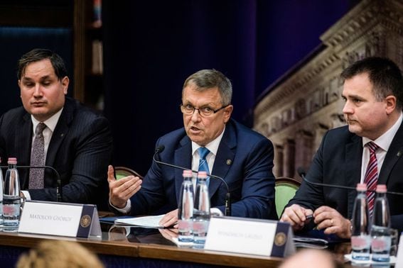 Gyorgy Matolcsy, governor of Hungary's central bank, center, gestures as he speaks alongside Marton Nagy, deputy governor of Hungary's central bank, left, and Laszlo Windisch, deputy governor of Hungary's central bank, right, during an interest rates decision briefing at the Magyar Nemzeti Bank in Budapest, Hungary, on Tuesday, March 26, 2019. Hungary's central bank took its first step to unwind monetary stimulus since 2011, the start of tightening by one of Europe's most enduring proponents of loose policy. Photographer: Akos Stiller/Bloomberg via Getty Images