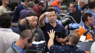 Traders work at Cboe (Scott Olson/Getty Images)