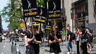 Members of the Writers Guild of America East and SAG-AFTRA in New York City (Alexi Rosenfeld/Getty Images)