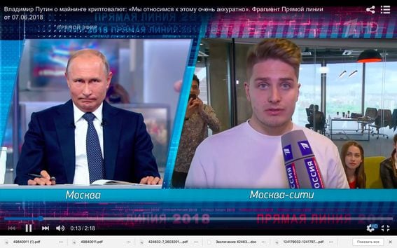 Vladimir Putin is answering the question about cryptocurrencies on the Russian TV
