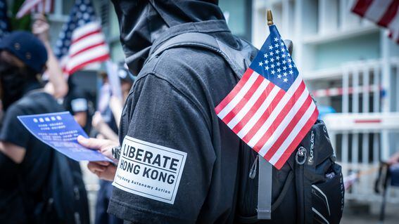 Major Hong Kong-based crypto companies will face new challenges in settling cross-border transactions if US sanctions in response to the national security law restrict or ban their access to the US dollar system. (Credit: Shutterstock)
