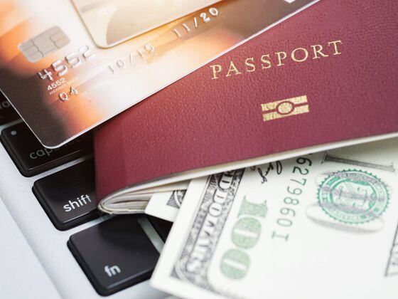 CDCROP: Passports, cards, money (PK Studio/Shutterstock)
