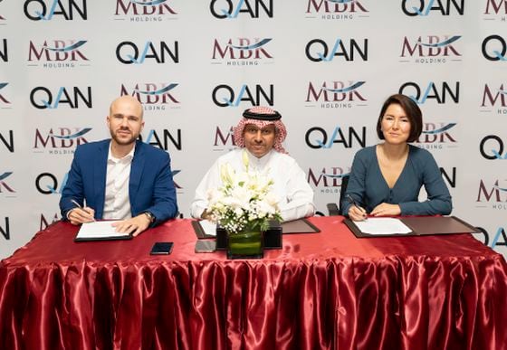 QANPlatform co-founder and CTO Johann Polecsak (left), with Qatari Sheikh Mansoor Bin Khalifa Al-Thani and QANPlatform CEO Jevgenia Kim. (QANPlatform)
