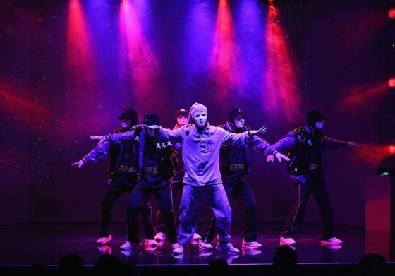 Members of the Jabbawockeez dance crew perform in Las Vegas. (Gabe Ginsberg/Getty Images)