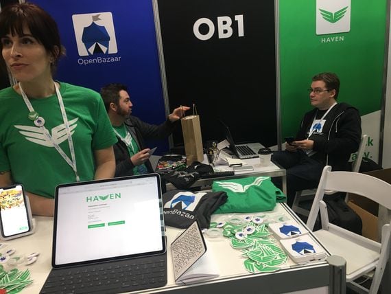 OB1 staff show off OpenBazaar at a 2019 conference. (CoinDesk archives)
