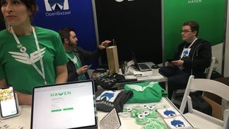 OB1 staff show off OpenBazaar at a 2019 conference. (CoinDesk archives)