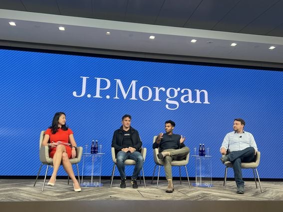 Left to right: JPMorgan's Christine Moy, Avalanche's Emin Gün Sirer, Messari's Ryan Watkins and Compound's Robert Leshner speak at JPM's crypto event on Nov. 30, 2021. (JPMorgan)