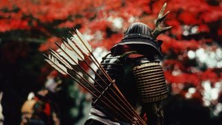 A Japanese man in circa 12th century samurai warrior clothing and carrying a quiver of arrows on his back. (Ernst Haas/Ernst Haas/Getty Images)