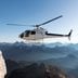 CDCROP: Helicopter transporting BASE jumpers to summit, Dolomites, Italy (Oliver Furrer/Getty Images)