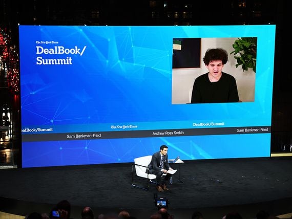 Andrew Ross Sorkin speaks with FTX founder Sam Bankman-Fried during the New York Times DealBook Summit (Michael M. Santiago/Getty Images)