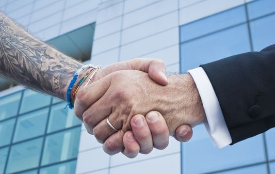 Tattoo handshake