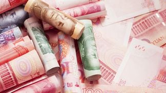 Chinese yuan image via Shutterstock