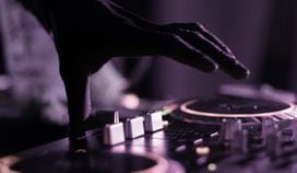 CDCROP: DJ mixing music (Marcela Laskowski/Unsplash, modified by CoinDesk)