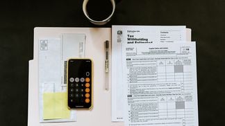 CDCROP: Tax Week forms prep (Kelly Sikkema/Unsplash)