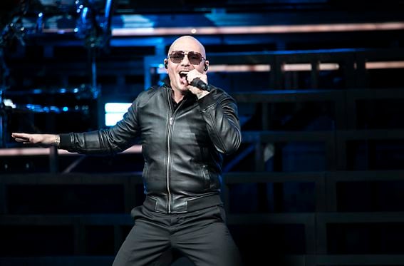 Pitbull performs on Oct. 9, 2021, in Charlotte, N.C. (Jeff Hahne/Getty Images)