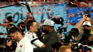 Tampa Bay quarterback Tom Brady celebrates winning the Super Bowl in 2021. (Mike Ehrmann/Getty Images)