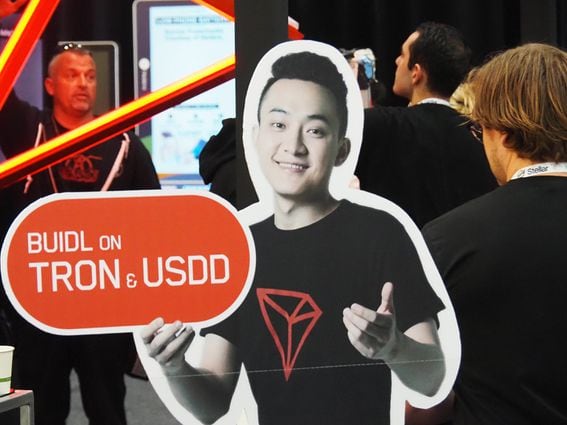 A cardboard cutout of Tron founder Justin Sun (Danny Nelson/CoinDesk)