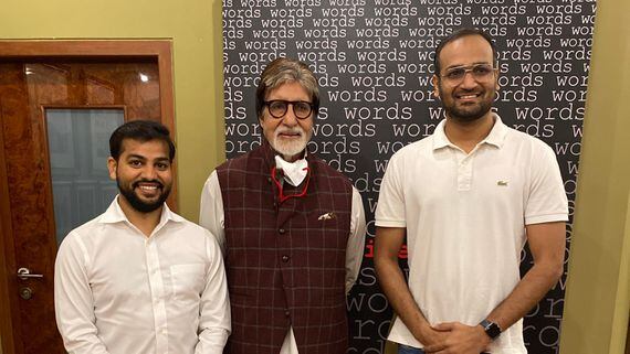 Amitabh Bachchan (centre) stands with CoinDCX's founders (CoinDCX)