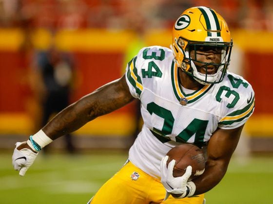KANSAS CITY, MO - AUGUST 25: Dexter Williams #34 of the Green Bay Packers runs with the football during the fourth quarter of a preseason game against the Kansas City Chiefs at Arrowhead Stadium on August 25, 2022 in Kansas City, Missouri. (Photo by David Eulitt/Getty Images)