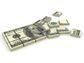 Illustration of a stack of $100 bills broken in squares (Getty Images)