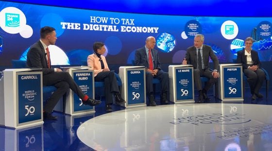 French finance minister Bruno Le Maire and others discuss how to tax Big Tech. (Credit: Leigh Cuen for CoinDesk)