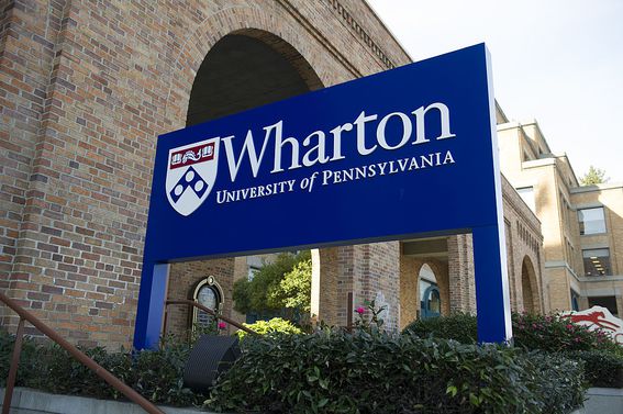 Signage for the University of Pennsylvania's Wharton School stands outside of the new campus in San Francisco, California, U.S., on Friday, Feb. 3, 2012. The University of Pennsylvania's Wharton School, the 131-year-old business school in Philadelphia, is counting on a new West Coast campus to raise its high-tech profile. Photographer: David Paul Morris/Bloomberg via Getty Images