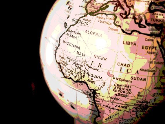 Globe focus on Africa (James Wiseman/Unsplash, modified by CoinDesk)