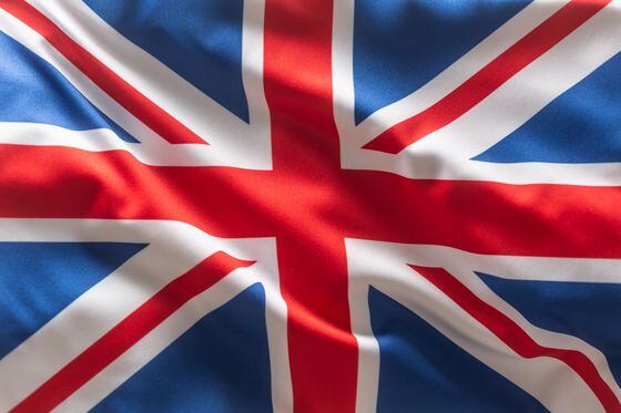 U.K. flag blowing in the wind.