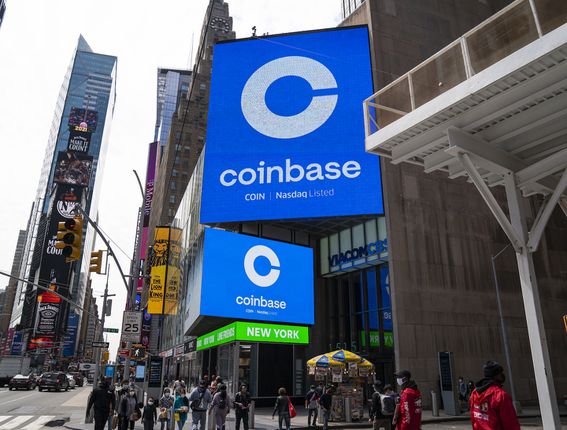 Monitors in Times Square display the Coinbase logo during the company's initial public offering. (Robert Nickelsberg/Getty Images)