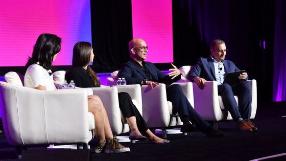 Panelists discuss tokenization on stage (Shutterstock/CoinDesk)