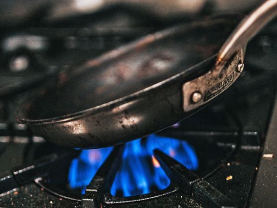 CDCROP: Frying pan over a burner on a stove (Andrew Valdivia/Unsplash)