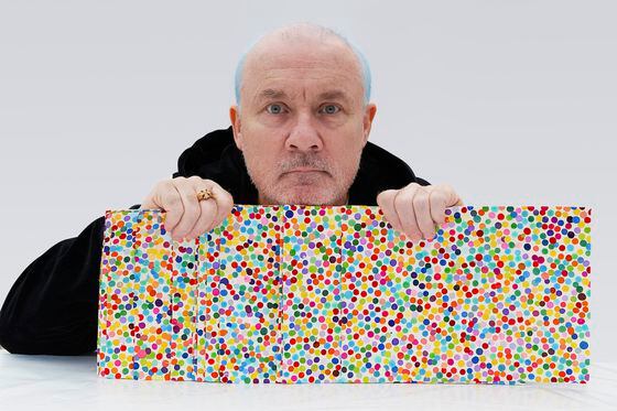 Damien Hirst with some of the works in his "The Currency" collection. (Damien Hirst)