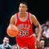 CDCROP: MILWAUKEE, WI - CIRCA 1990: Scottie Pippen #33 of the Chicago Bulls dribbles the ball against the Milwaukee Bucks during an NBA basketball game circa 1990 at the Bradley Center in Milwaukee, Wisconsin. (Focus on Sport/Getty Images)