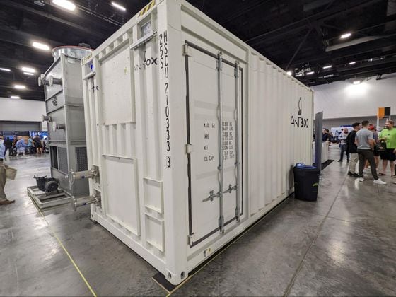 One of Bitmain’s Antbox containers on the conference floor. (Aoyon Ashraf/CoinDesk)