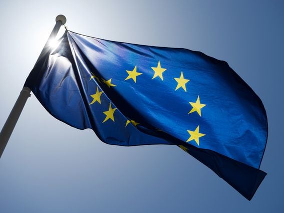 CDCROP: Series of images of the EU flag flying in the wind, backlight and blue sky (Getty Images)