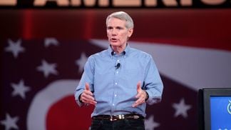 Sen. Rob Portman (R-OH), one of the main sponsors of the bipartisan infrastructure bill, speaks at the 2015 Defending the American Dream Summit at the Greater Columbus Convention Center in Columbus, Ohio.