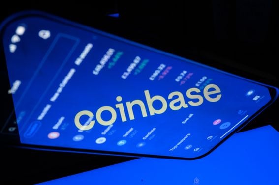 Coinbase share were rallying Friday. (Photo illustration by Leon Neal/Getty Images)