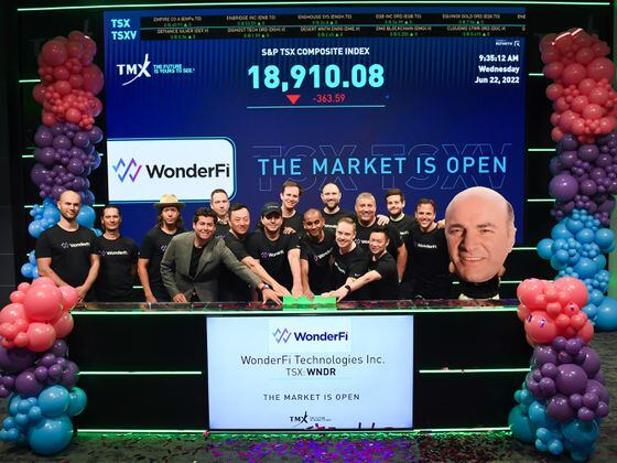 WonderFi, Coinberry team, and Kevin O'Leary cardboard cutout at the TSX