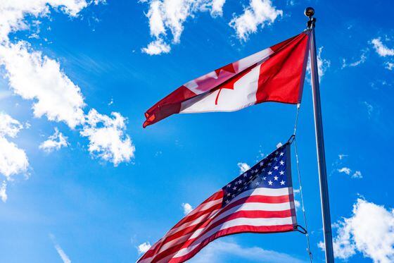 US Canada flag (Chris Robert/Unsplash)