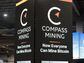 Compass Mining's booth at Mining Disrupt in Miami in July 2022. (Eliza Gkritsi/CoinDesk)