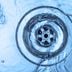 CDCROP: Drain water going down downwards spiral (Shutterstock)