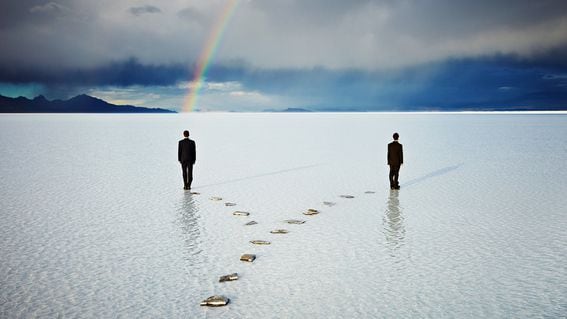 CDCROP: Two men on forked pathway in water under rainbow (Thomas Barwick/Getty Images)